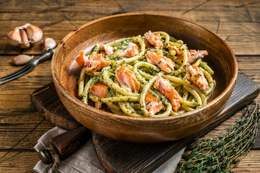 Italian traditional Pasta al Salmone, Bucatini pasta with Smoked Salmon.